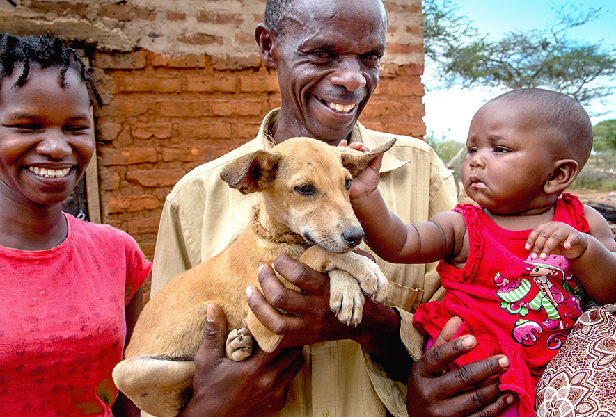 African family and dog