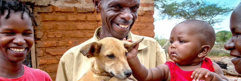 African family and dog